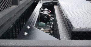 Closeup of an Impac lift in a truck bed.