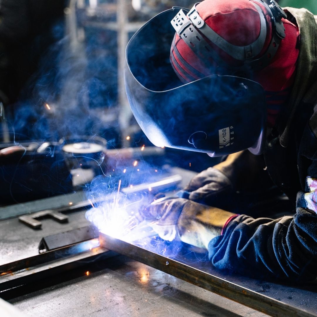 someone welding metal