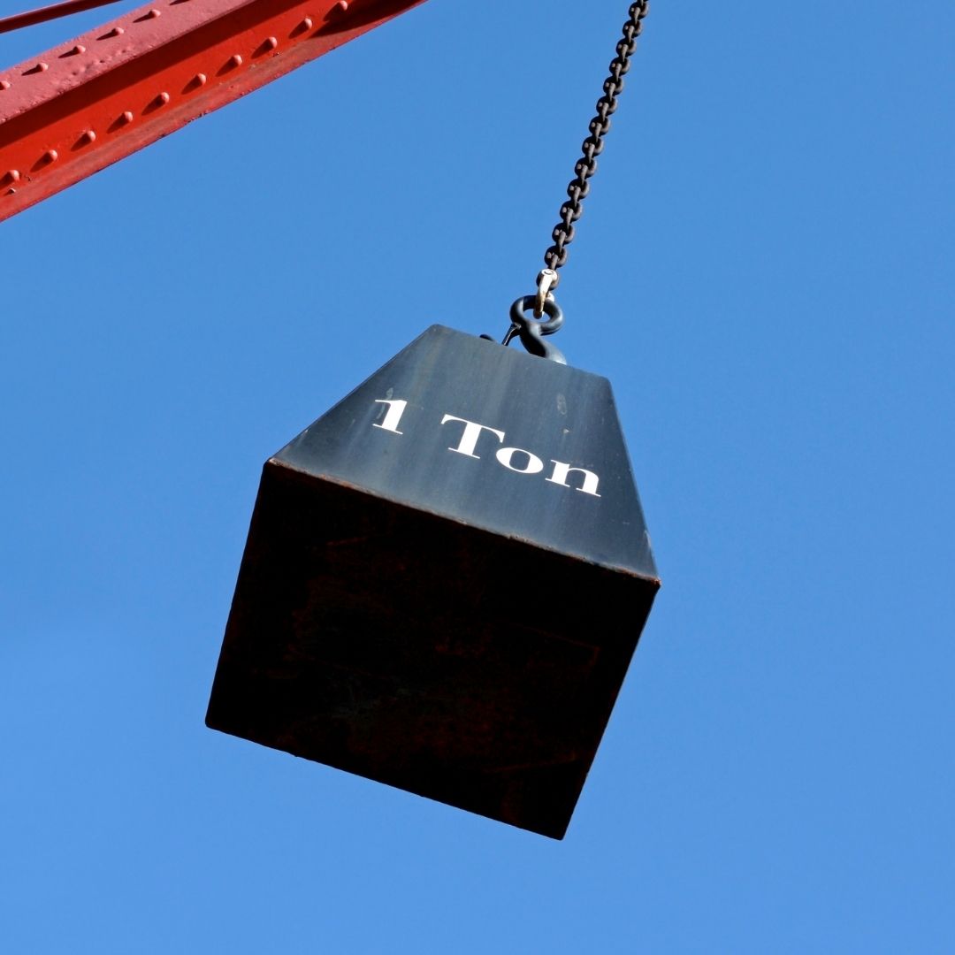 a weight labeled 1 ton