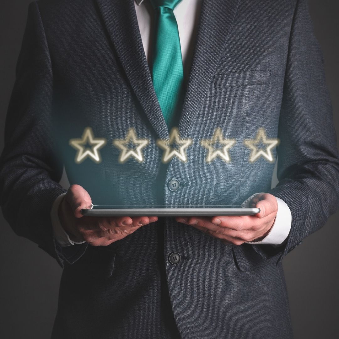 a 5 star rating displaying over a tablet